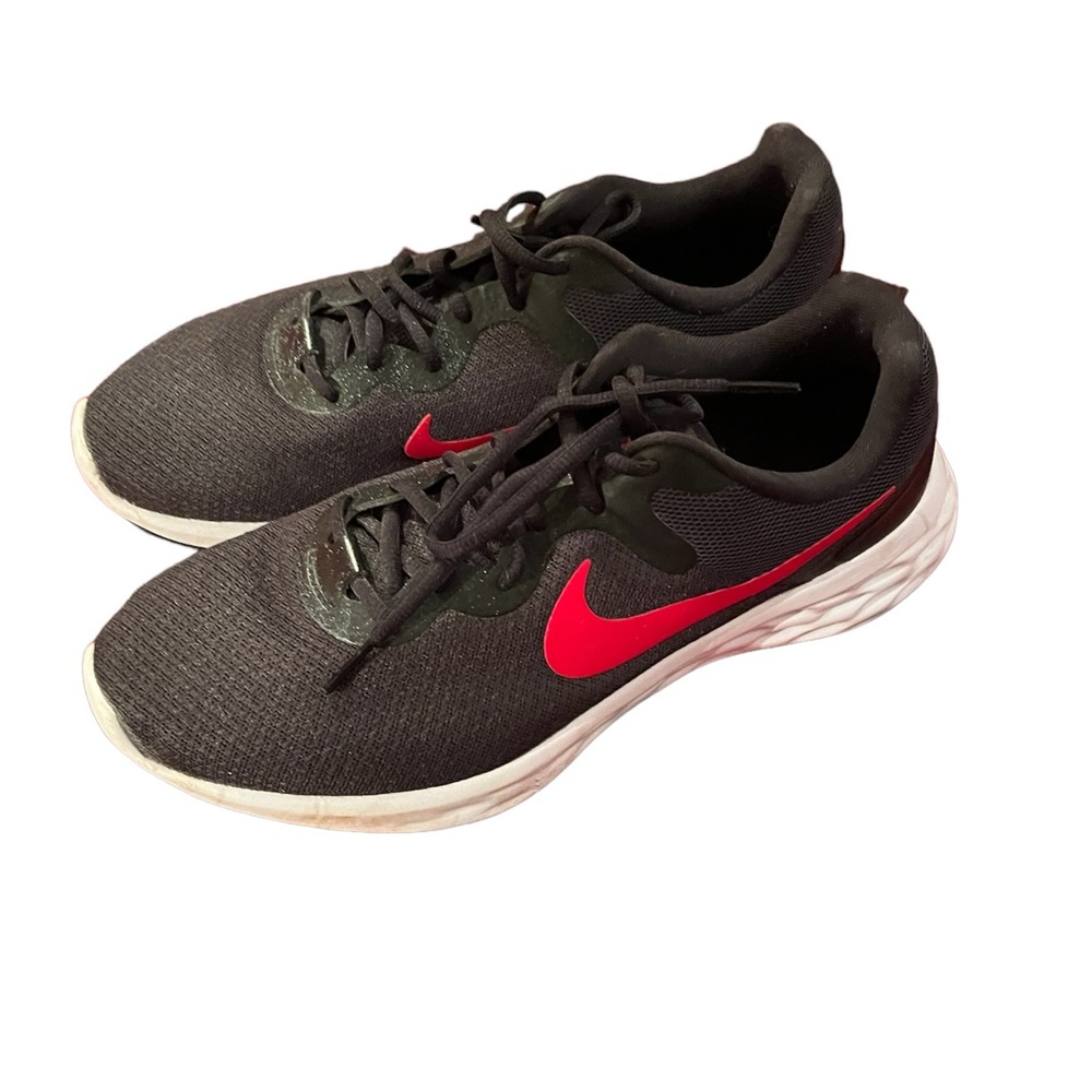 NIKE REVOLUTION brand tennis shoes. Size 10. Gently worn.
